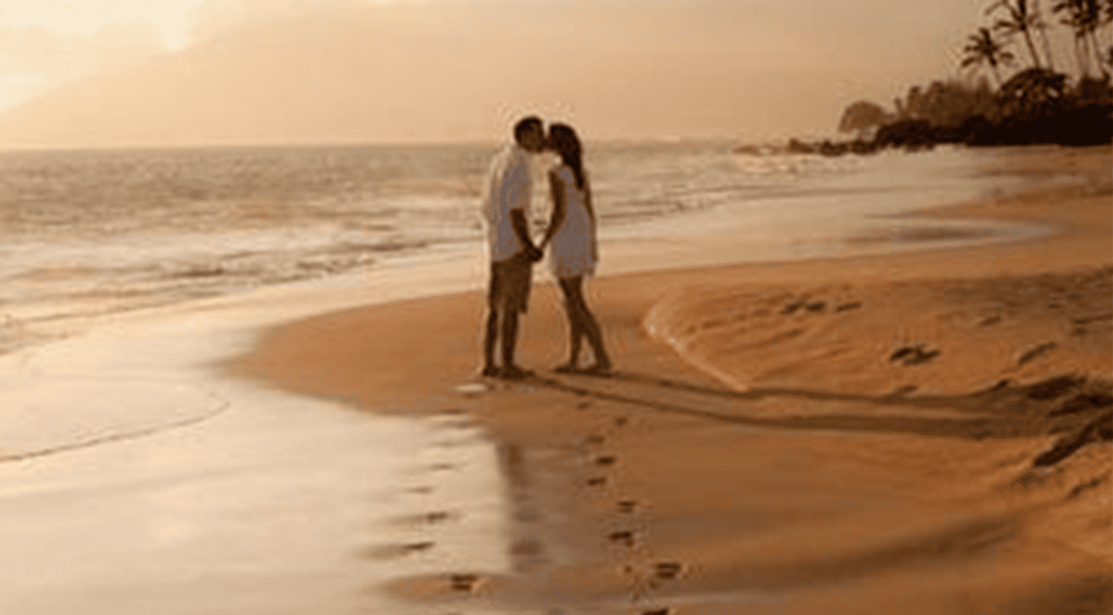 Couple on an Andaman beach at sunset